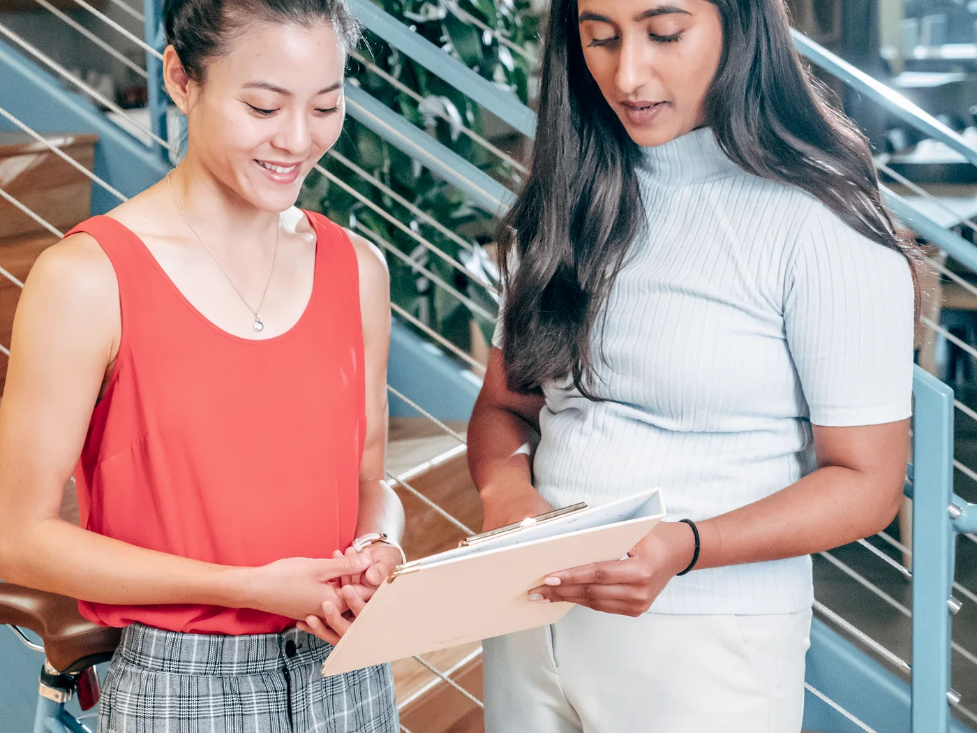 Professionals reviewing employment documents for written verification of employment