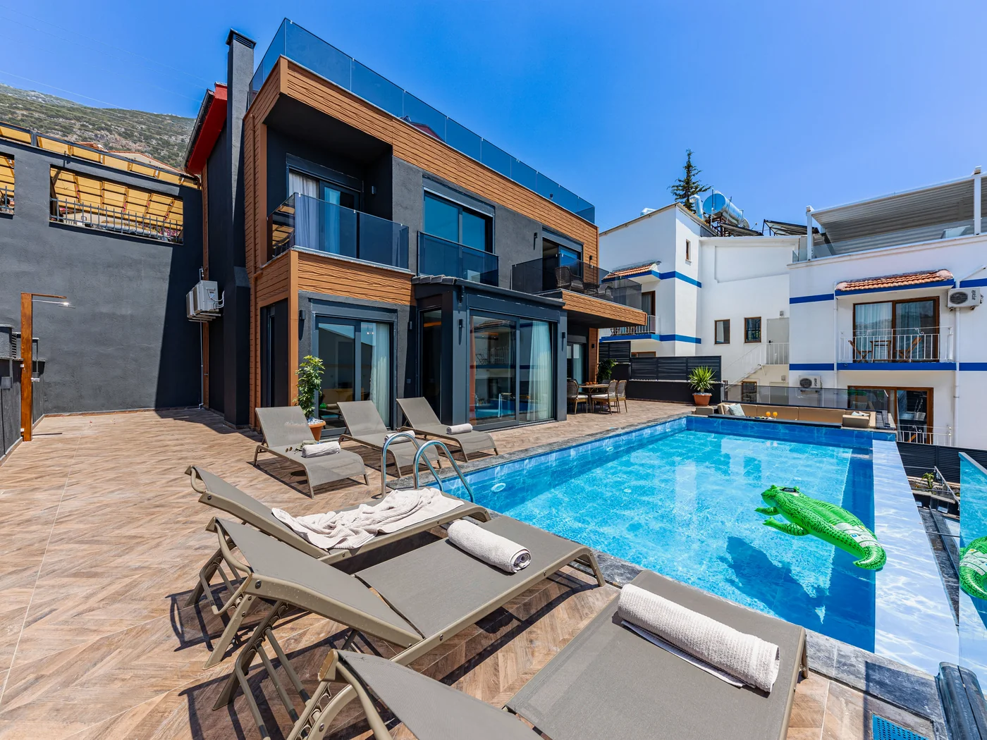 Modern vacation rental home with a swimming pool representing short-term rental DSCR financing
