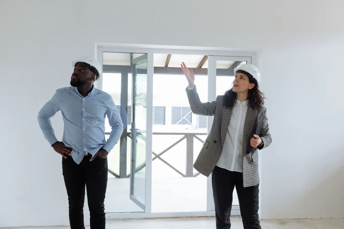 Property professionals reviewing a rental property improvement project